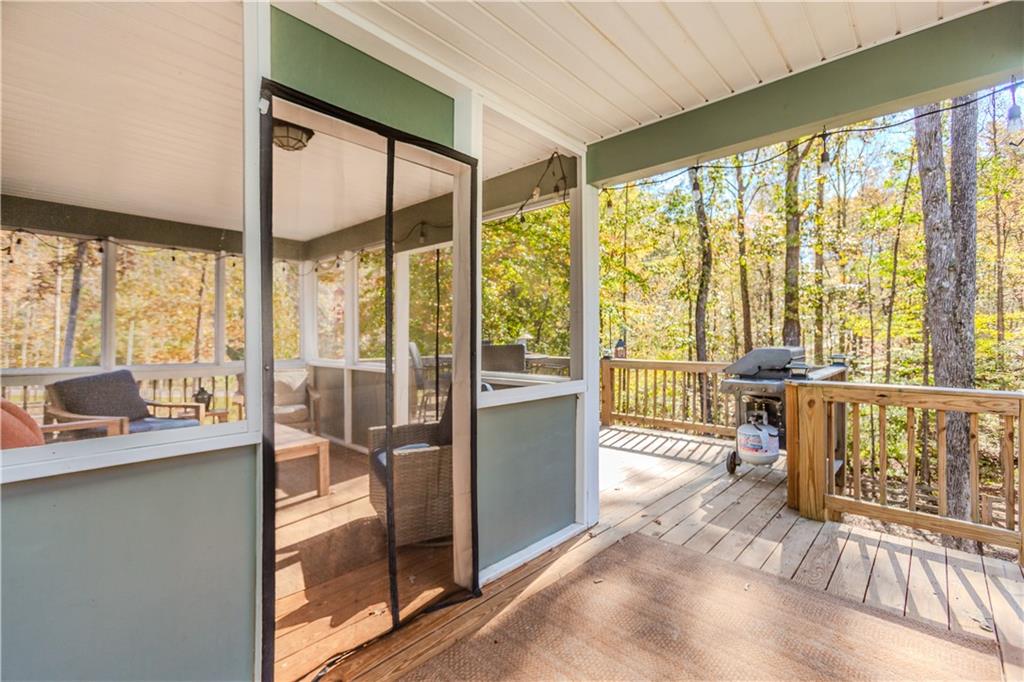 43 Water Lily Way Pendergrass, GA 30567 - Photo 43 of 71 a room with wooden floor and furniture