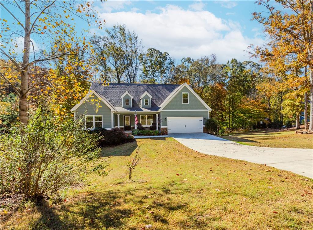 43 Water Lily Way Pendergrass, GA 30567 - Photo 69 of 71 a front view of a house with a yard