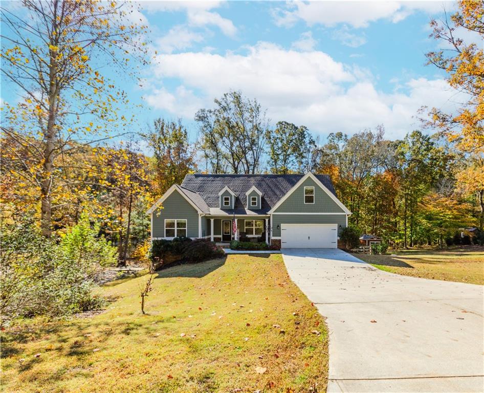 43 Water Lily Way Pendergrass, GA 30567 - Photo 71 of 71 a front view of house with yard outdoor seating and barbeque oven