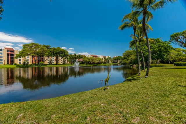 a view of a lake with a building in front of it