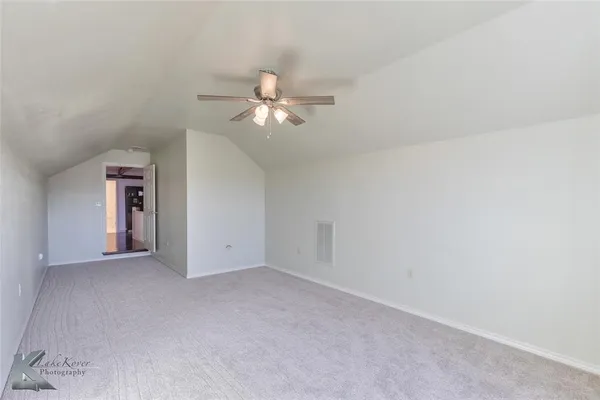 a view of a house with a swimming pool