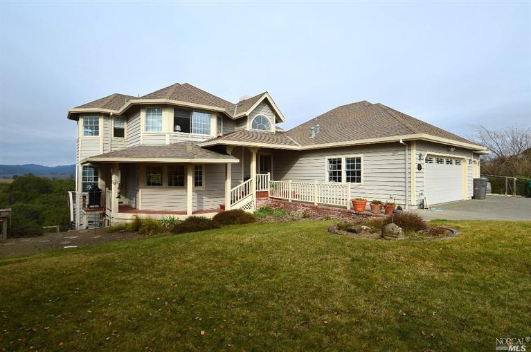 2859 Laguna Road Forestville, CA 95436 - Photo 1 of 1 a front view of a house with a garden