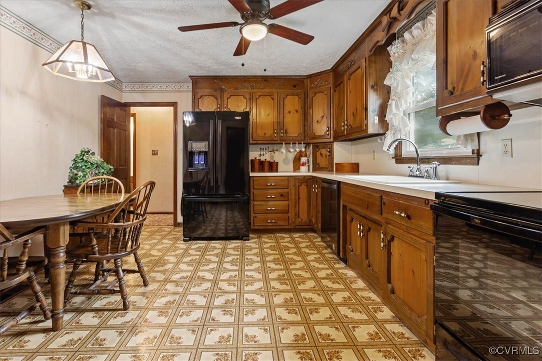 3528 Maple Ridge Lane Hopewell, VA 23860 - Photo 15 of 29 a kitchen with stainless steel appliances granite countertop a sink and a refrigerator