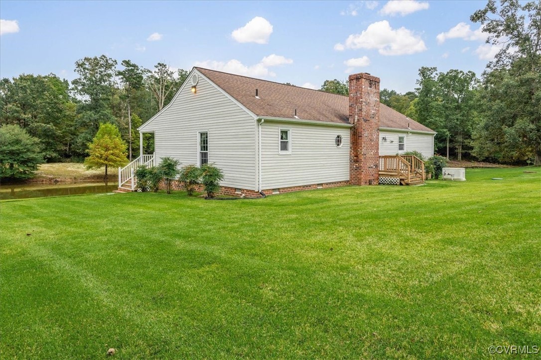 3528 Maple Ridge Lane Hopewell, VA 23860 - Photo 26 of 29 a front view of house with yard and green space