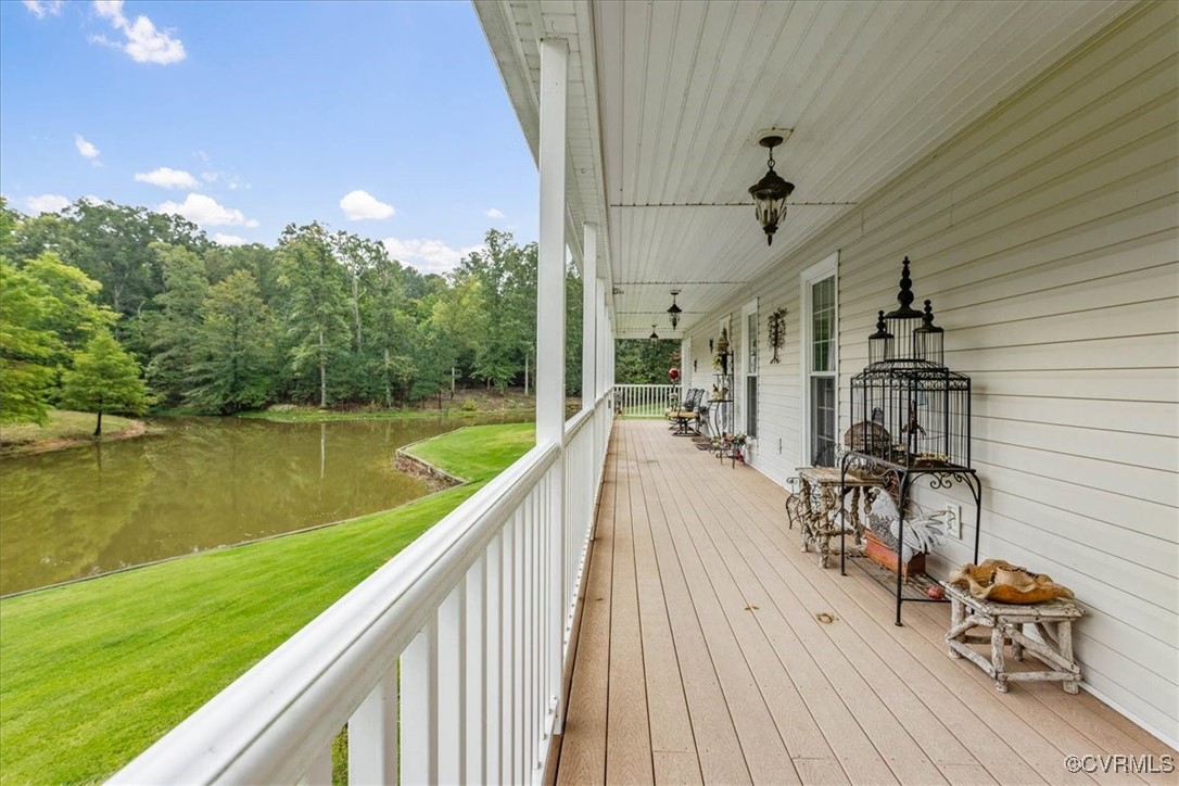 3528 Maple Ridge Lane Hopewell, VA 23860 - Photo 8 of 29 a view of a lake with a patio