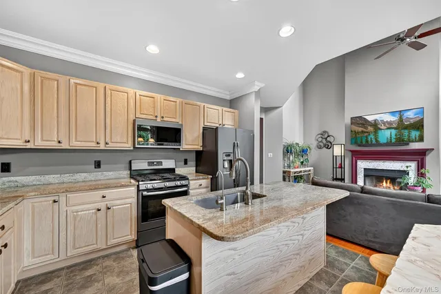 an aerial view of a house swimming pool and outdoor space