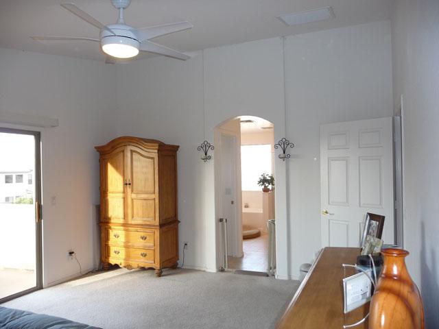 2416 West Carter Road Phoenix, AZ 85041 - Photo 18 of 32 wooden floor in an empty room with a window