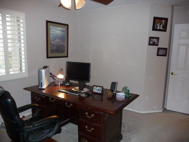 2416 West Carter Road Phoenix, AZ 85041 - Photo 22 of 32 a view of a workspace with furniture