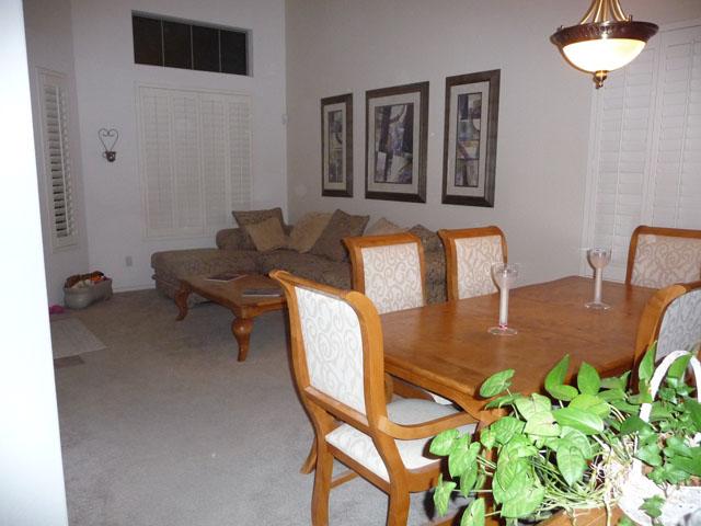 2416 West Carter Road Phoenix, AZ 85041 - Photo 30 of 32 a living room with furniture and a window