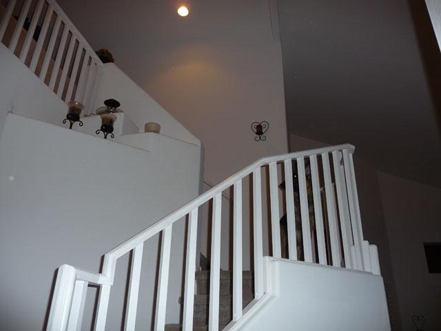 2416 West Carter Road Phoenix, AZ 85041 - Photo 32 of 32 a view of wooden staircase