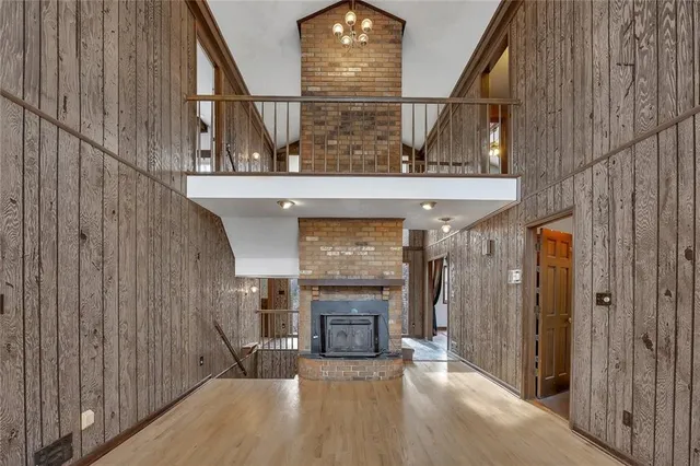 a view of an empty room with windows