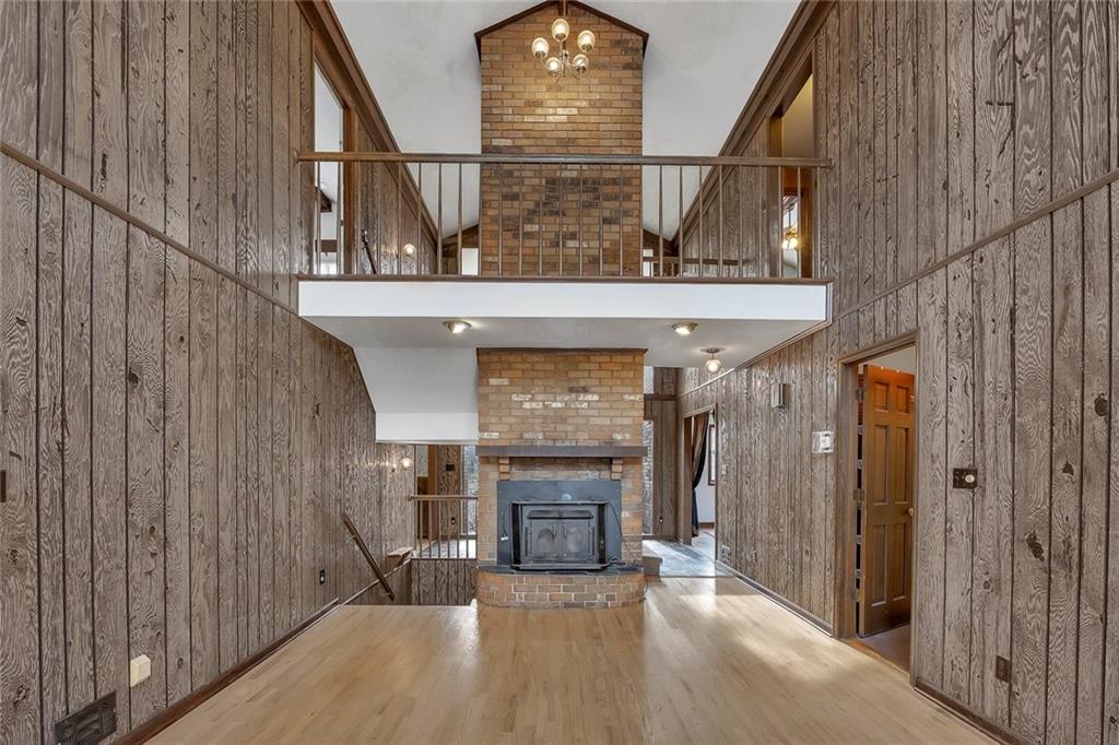 1113 Honeysuckle Drive Canton, GA 30114 - Photo 18 of 57 a view of a livingroom with an empty space and a fireplace