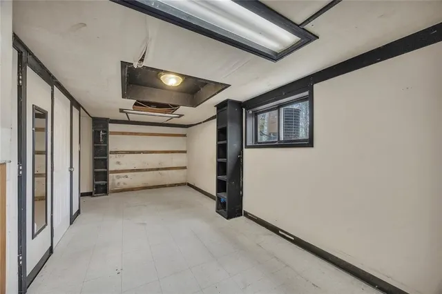 a view of balcony with wooden floor and fence