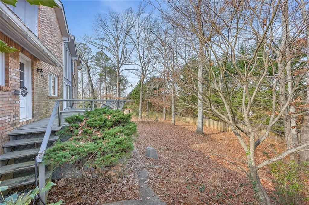 1113 Honeysuckle Drive Canton, GA 30114 - Photo 49 of 57 a view of a house with a yard