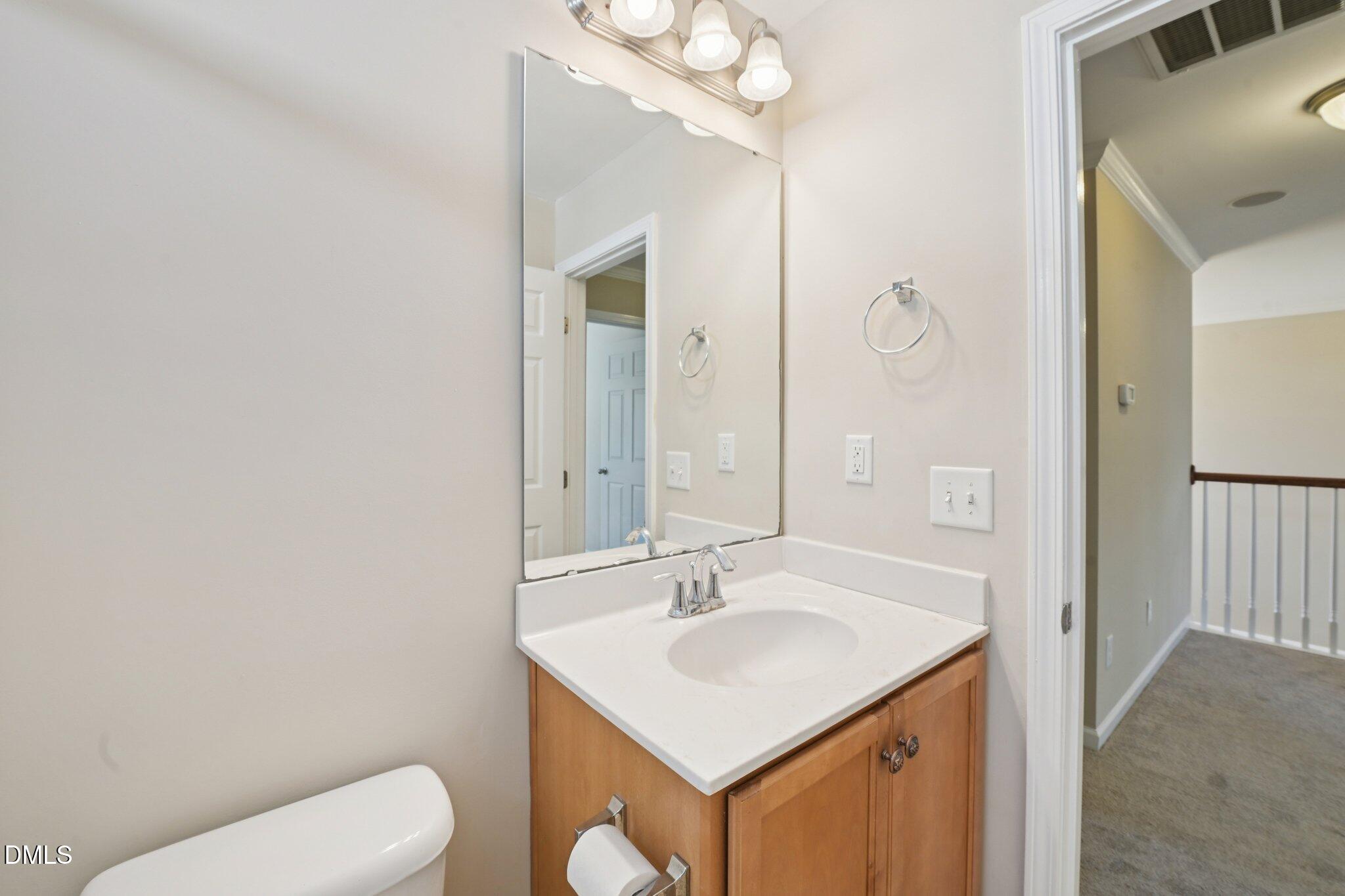 11 Hidden Ridge Court Durham, NC 27707 - Photo 26 of 30 a bathroom with a sink toilet and shower
