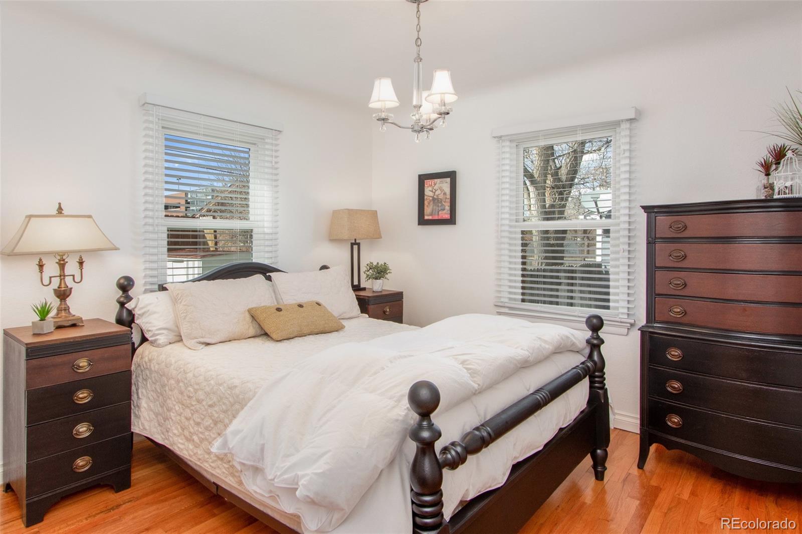 1635 Montview Road Greeley, CO 80631 - Photo 11 of 25 a bedroom with a bed and a dresser