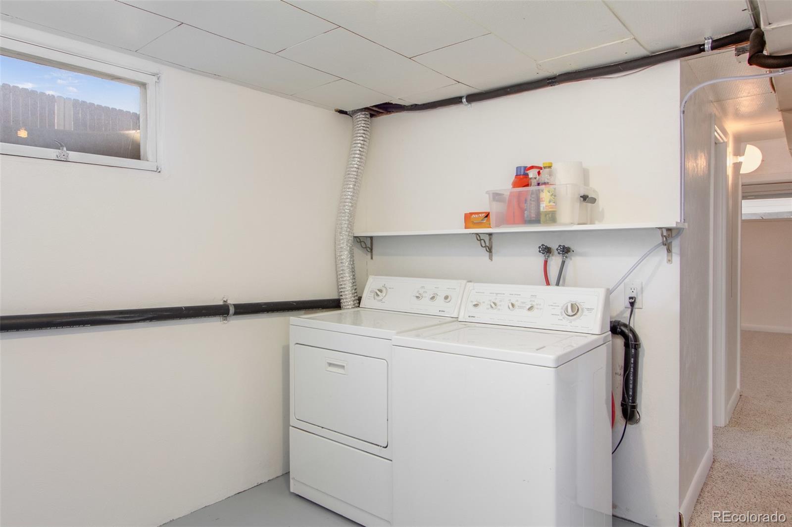 1635 Montview Road Greeley, CO 80631 - Photo 22 of 25 a utility room with dryer and washer