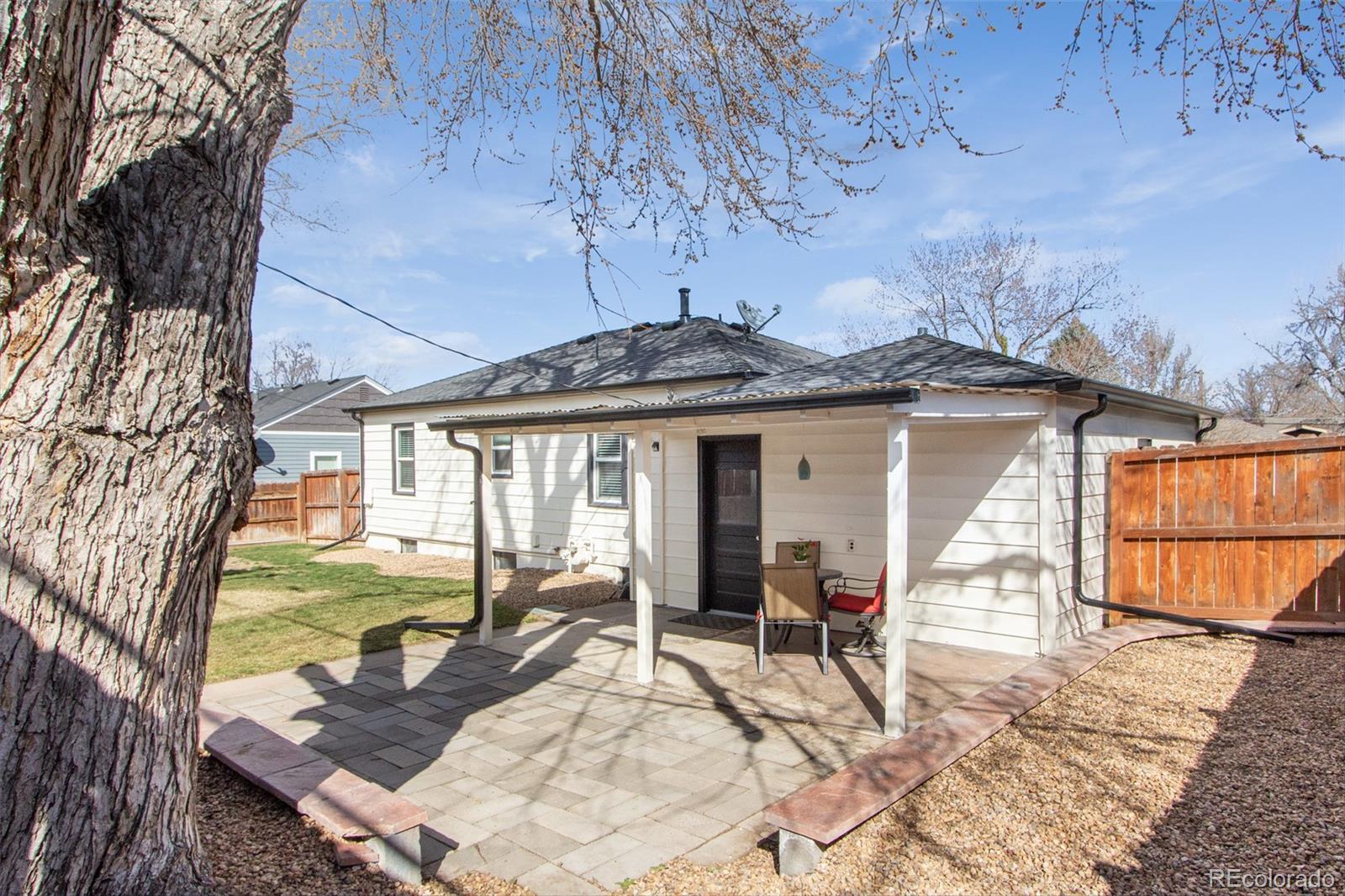 1635 Montview Road Greeley, CO 80631 - Photo 24 of 25 a view of a house with backyard and sitting area
