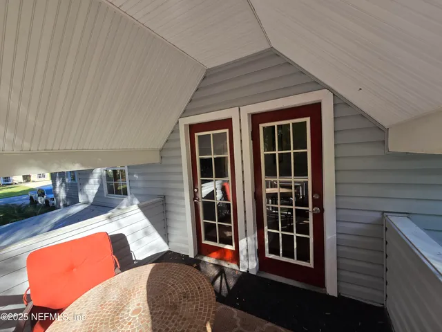 a backyard of a house with seating space