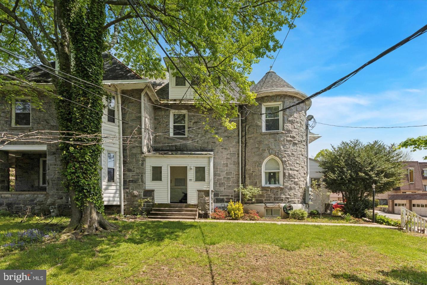 35 Windermere Avenue Lansdowne, PA 19050 - Photo 1 of 13 a front view of a house with a yard