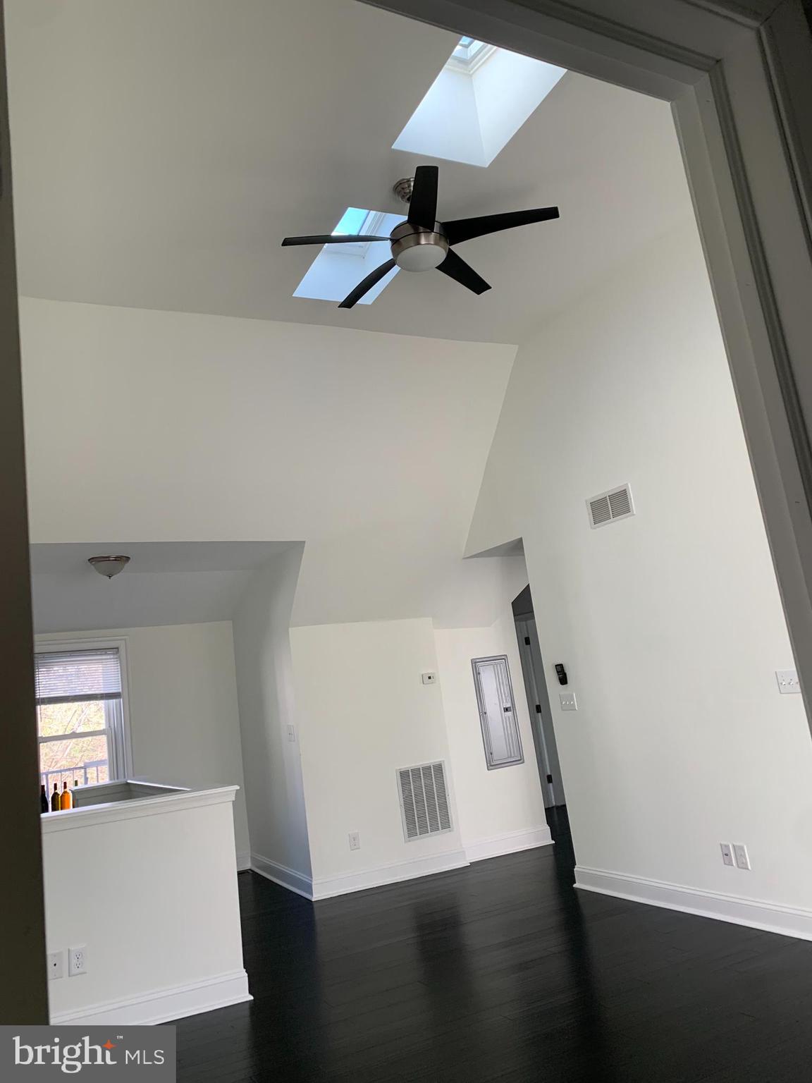 35 Windermere Avenue Lansdowne, PA 19050 - Photo 7 of 13 walk in closet with wooden floor washer and dryer