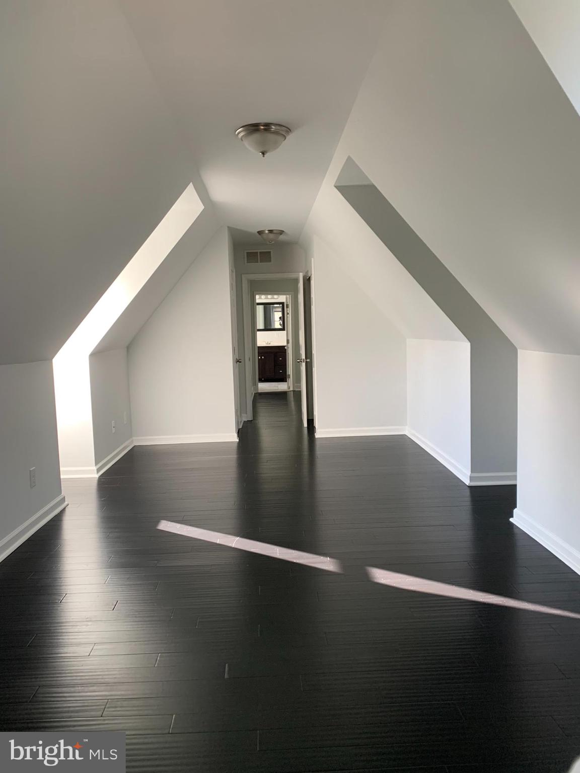 35 Windermere Avenue Lansdowne, PA 19050 - Photo 9 of 13 a view of a hallway with wooden floor