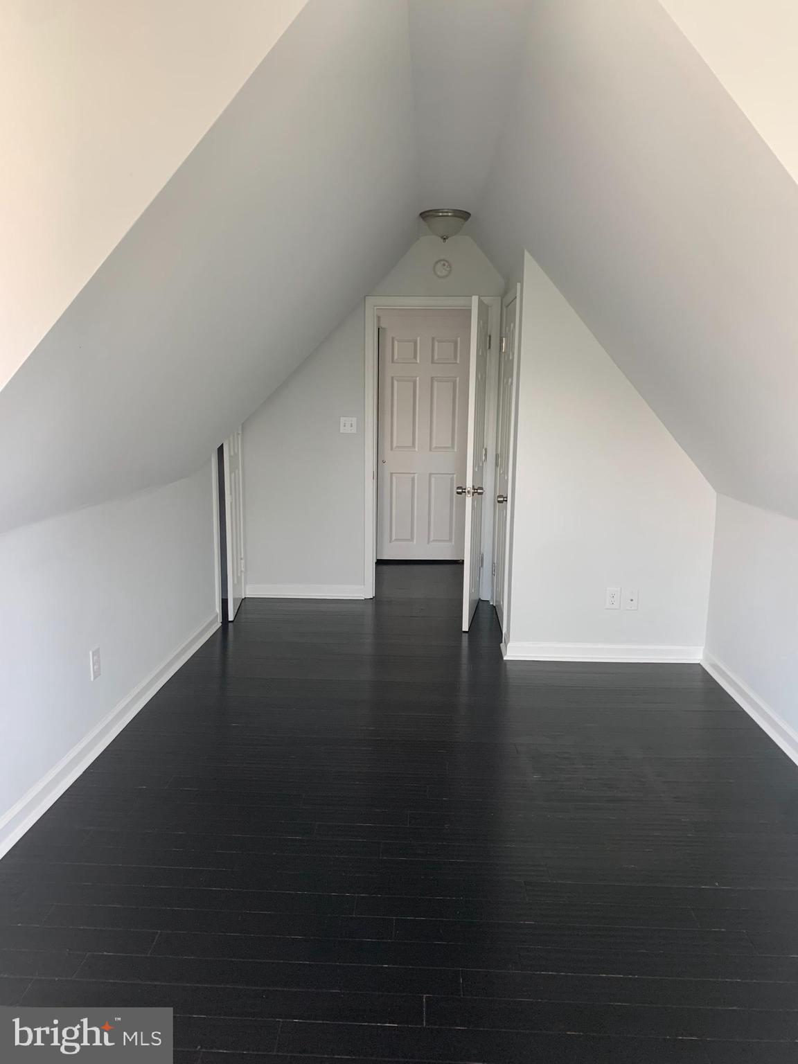 35 Windermere Avenue Lansdowne, PA 19050 - Photo 10 of 13 a view of a livingroom with wooden floor and a window
