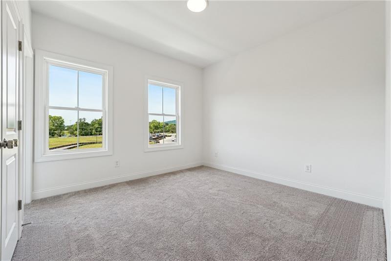 504 Healy Drive Cumming, GA 30040 - Photo 16 of 25 an empty room with windows