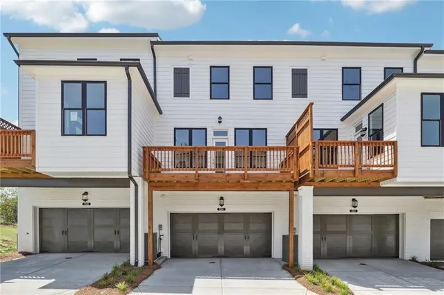 a view of building with glass windows and a fireplace