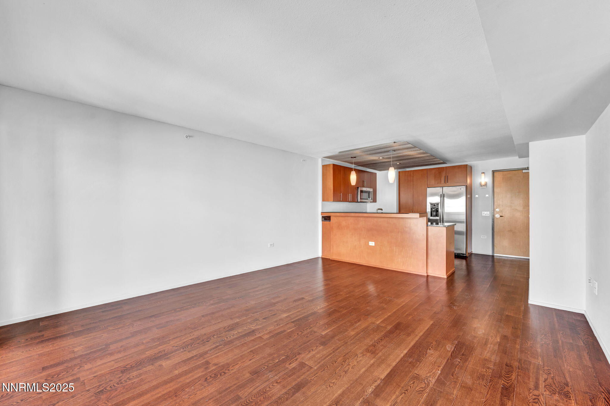 255 North Sierra Street, Unit 1908 Reno, NV 89501 - Photo 11 of 55 a view of a kitchen with wooden floor