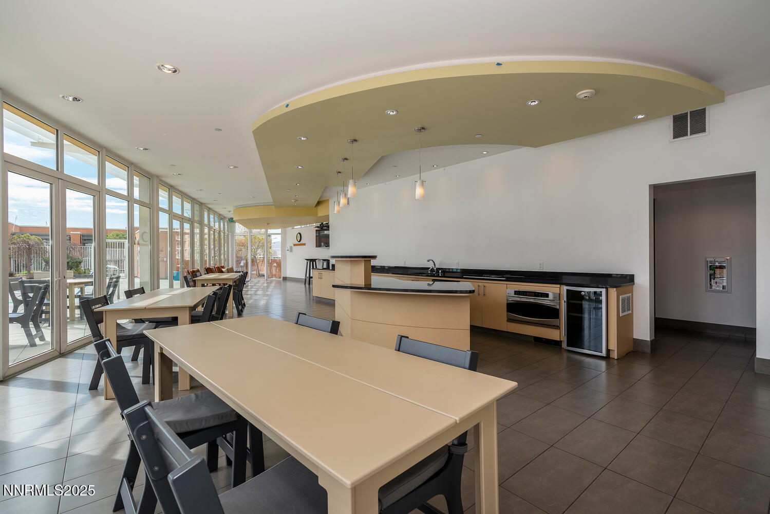 255 North Sierra Street, Unit 1908 Reno, NV 89501 - Photo 51 of 55 a open kitchen with a table and chairs