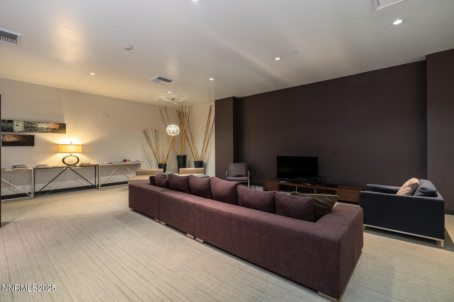 255 North Sierra Street, Unit 1908 Reno, NV 89501 - Photo 54 of 55 a living room with furniture and a flat screen tv