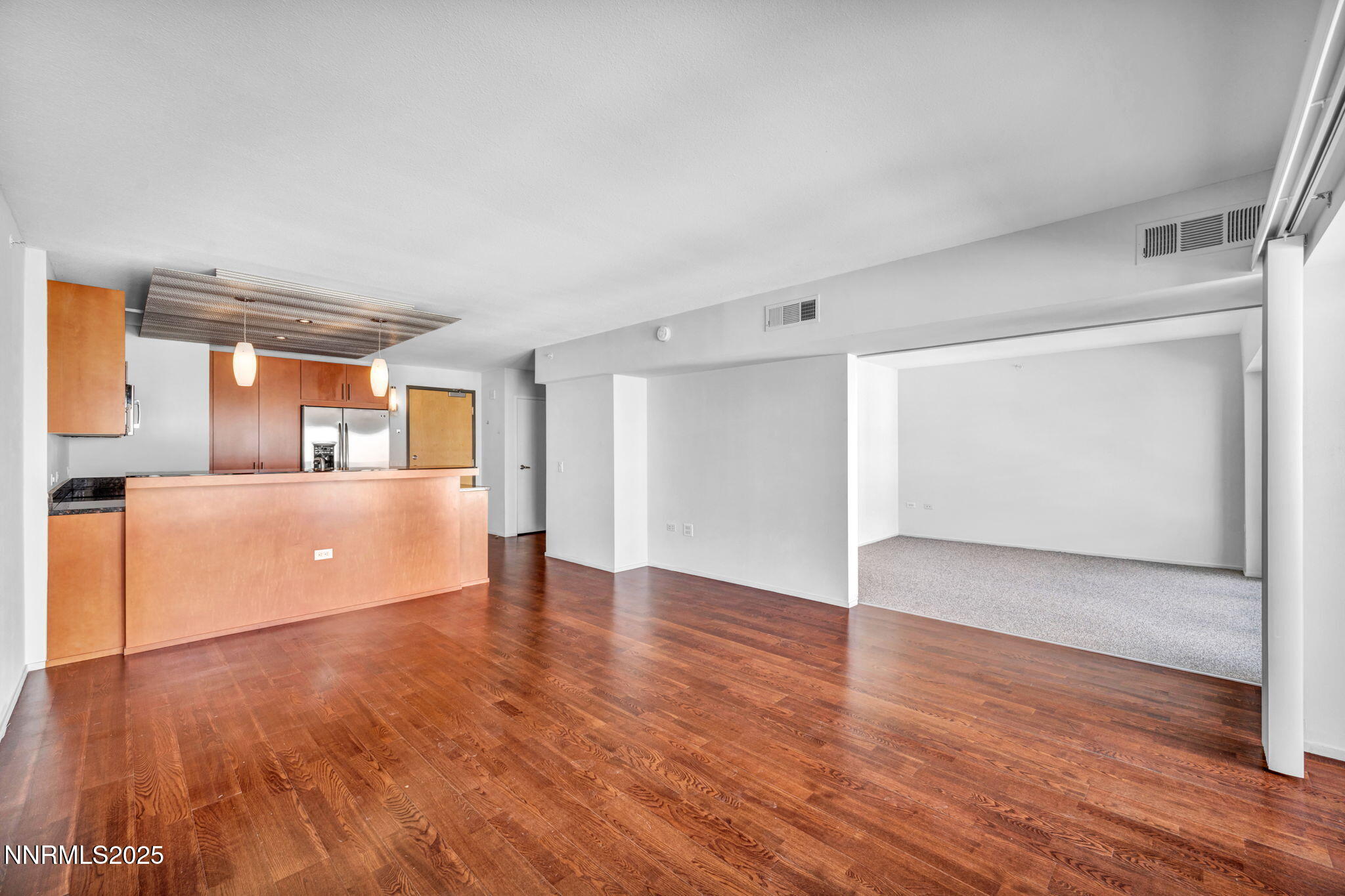 255 North Sierra Street, Unit 1908 Reno, NV 89501 - Photo 10 of 55 a view of empty room with wooden floor