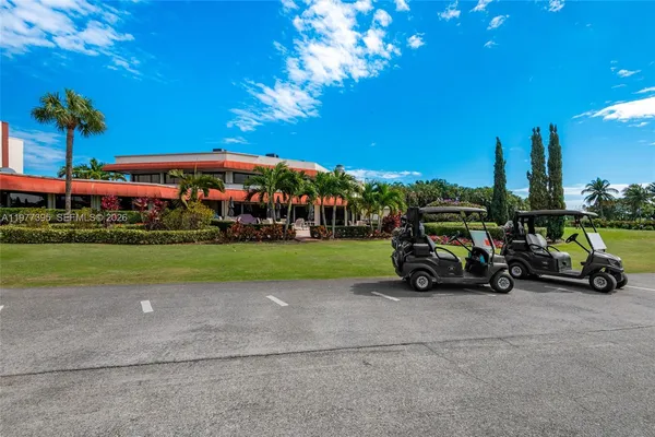 a view of a parked cars in front of a building