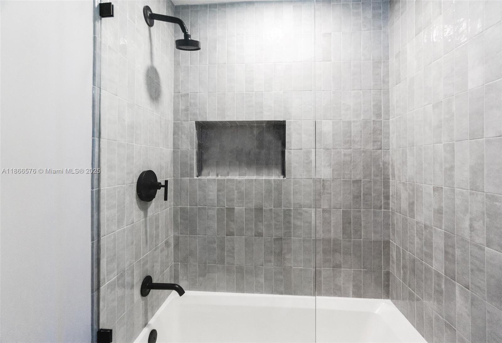 60 Southwest 13th Street, Unit 4802 Miami, FL 33130 - Photo 17 of 23 a bathroom with a shower