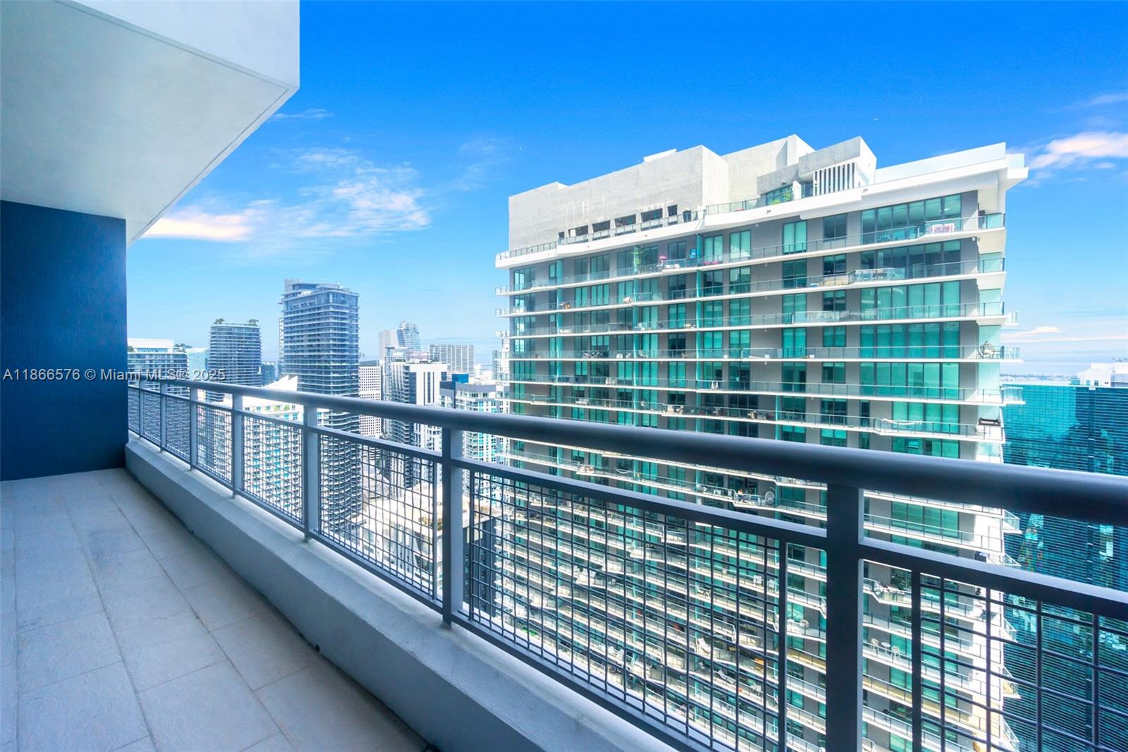 60 Southwest 13th Street, Unit 4802 Miami, FL 33130 - Photo 18 of 23 a view of a balcony with a large window