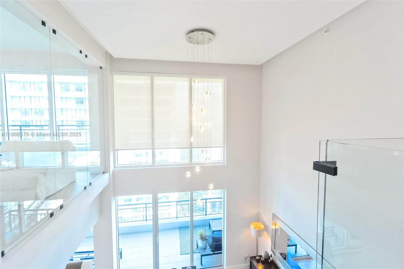 60 Southwest 13th Street, Unit 4802 Miami, FL 33130 - Photo 10 of 23 a view of an empty room with a window