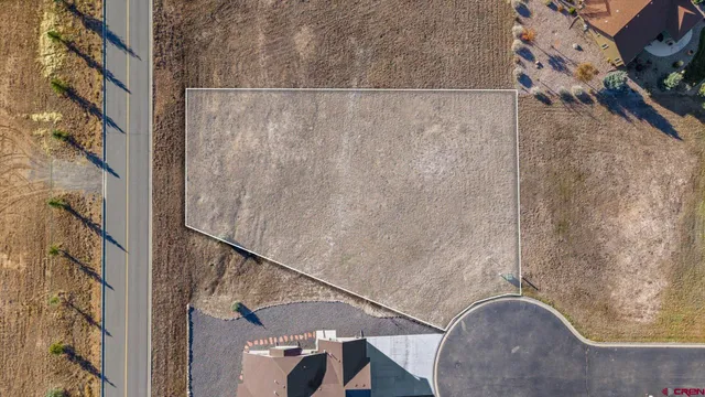 a view of balcony with wooden floor