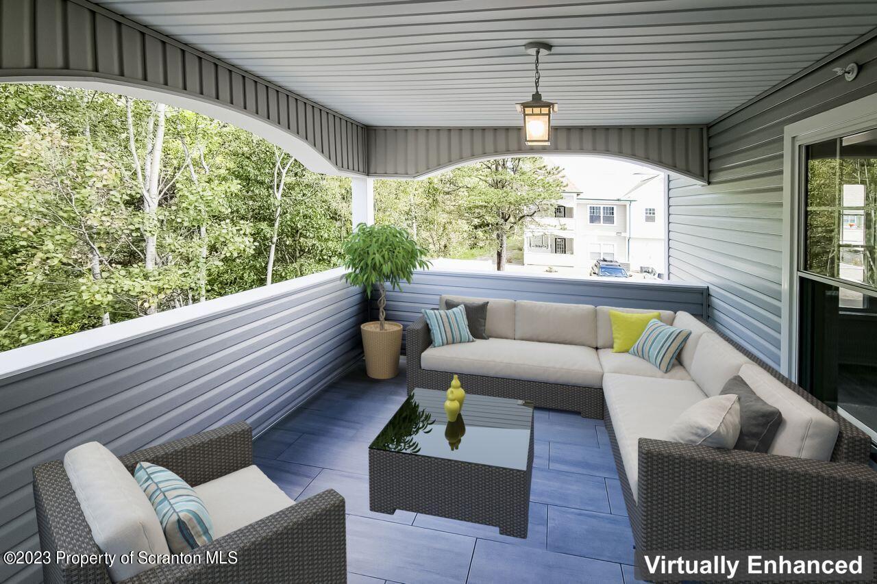 163 Bianca Way Old Forge, PA 18518 - Photo 12 of 24 a outdoor living space with furniture and a potted plant