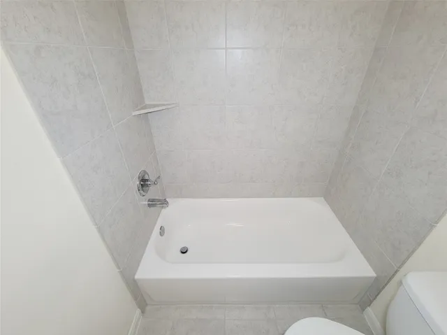 a bathroom with a bathtub