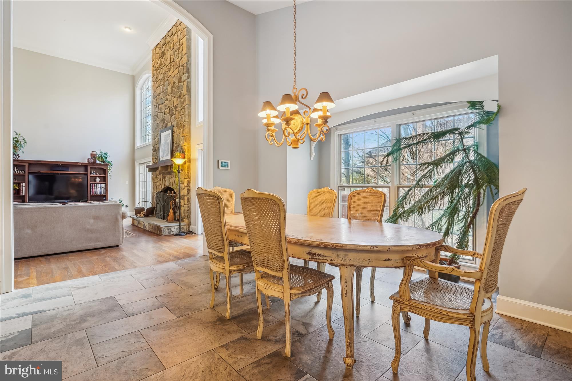 6100 Solitaire Way McLean, VA 22101 - Photo 14 of 60 a dining room with furniture and chandelier