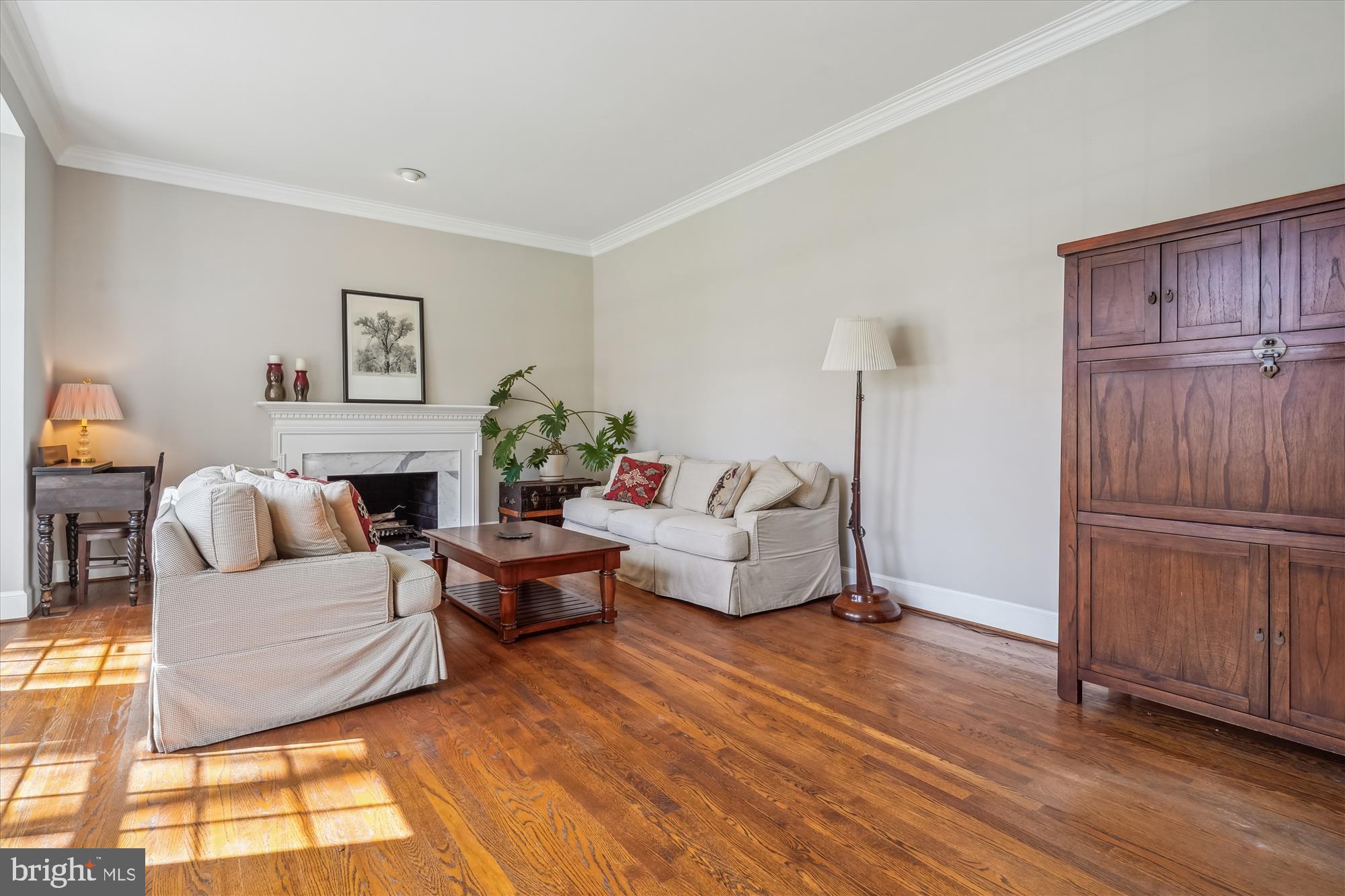 6100 Solitaire Way McLean, VA 22101 - Photo 17 of 60 a living room with furniture and a fireplace