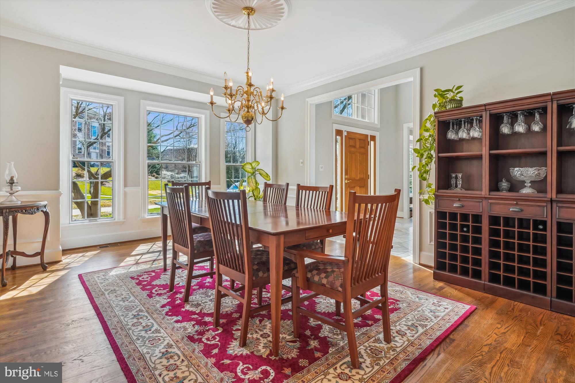 6100 Solitaire Way McLean, VA 22101 - Photo 20 of 60 a view of a dining room with furniture window and wooden floor