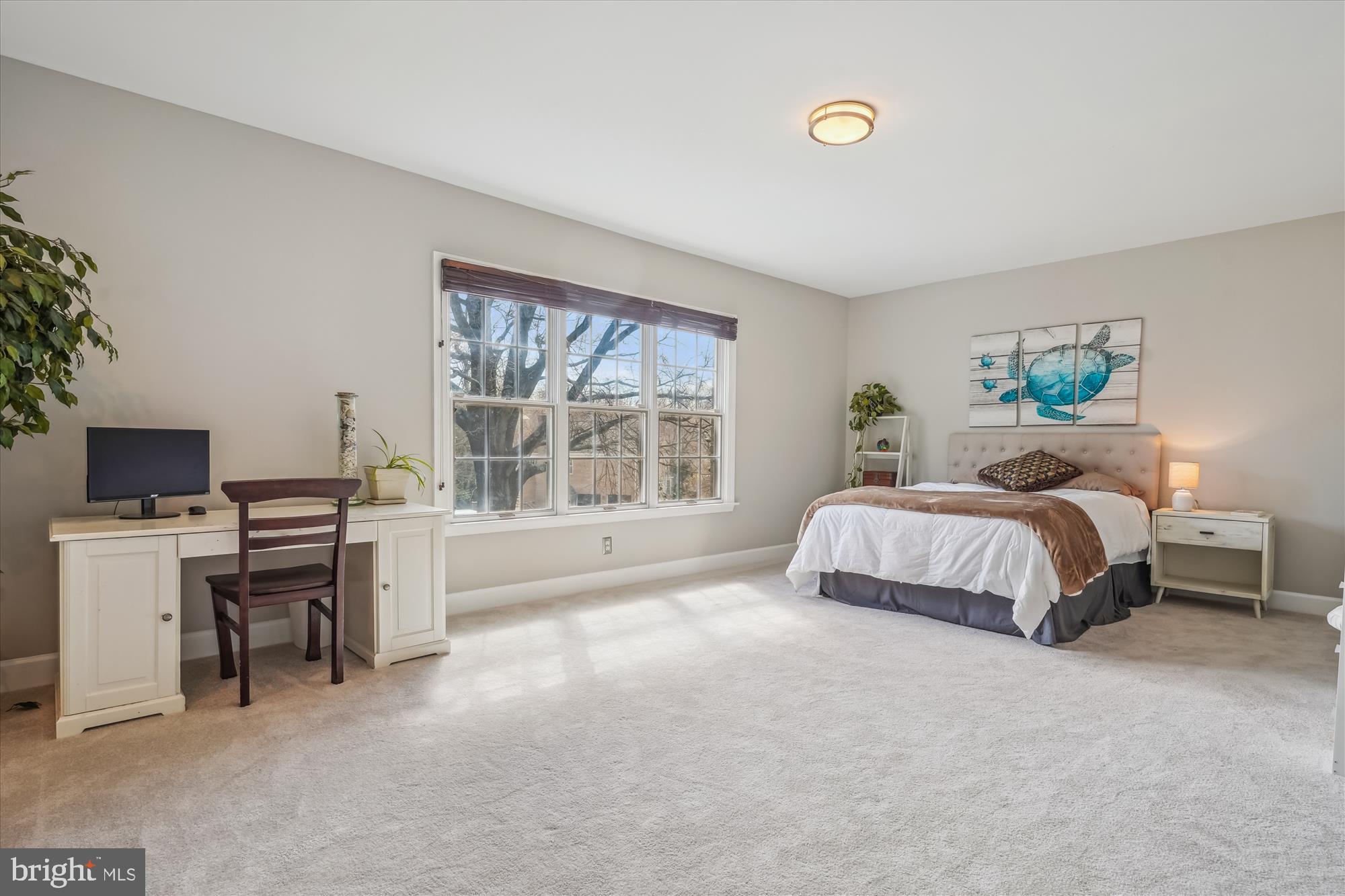 6100 Solitaire Way McLean, VA 22101 - Photo 28 of 60 a bedroom with a bed and a desk