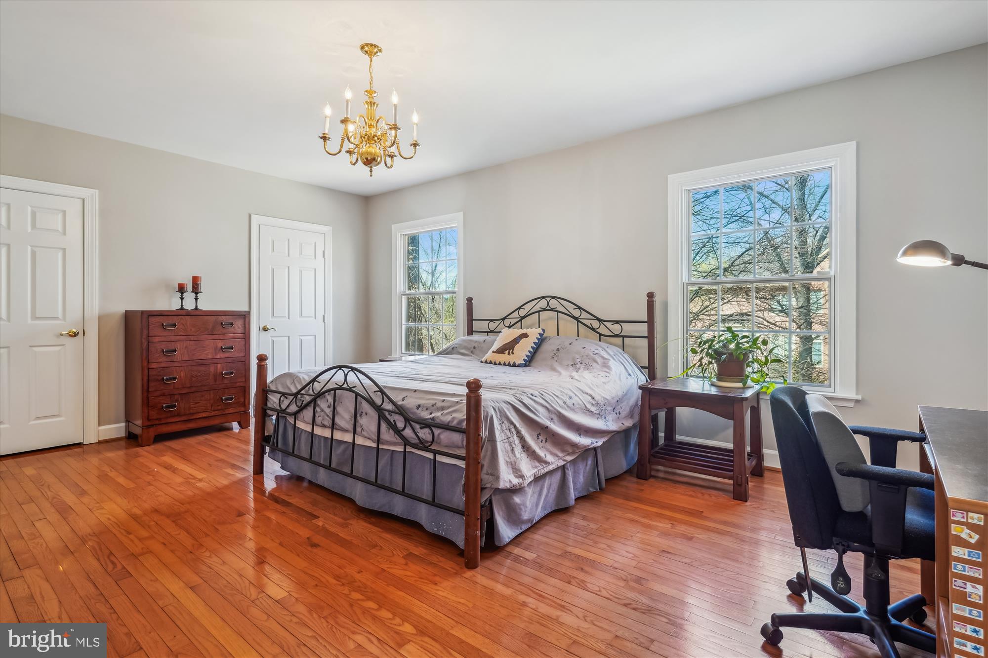 6100 Solitaire Way McLean, VA 22101 - Photo 32 of 60 a bedroom with a bed and a table