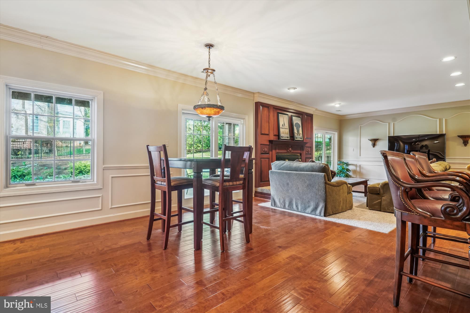 6100 Solitaire Way McLean, VA 22101 - Photo 41 of 60 a view of a dining room with furniture window and wooden floor