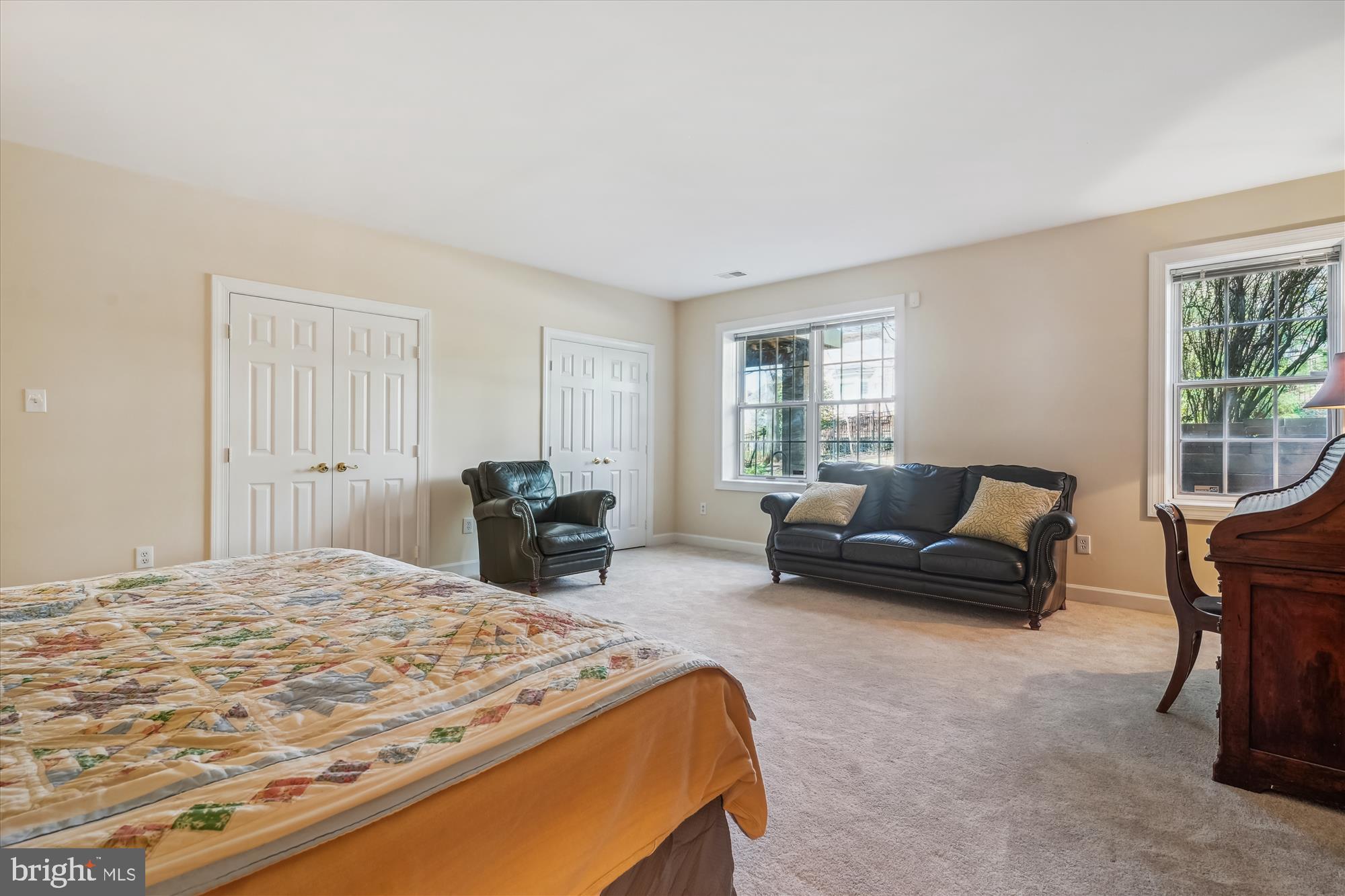 6100 Solitaire Way McLean, VA 22101 - Photo 45 of 60 a bedroom with a bed and couch