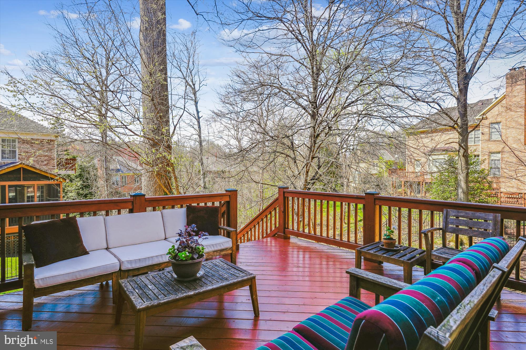 6100 Solitaire Way McLean, VA 22101 - Photo 53 of 60 a roof deck with couches and wooden floor
