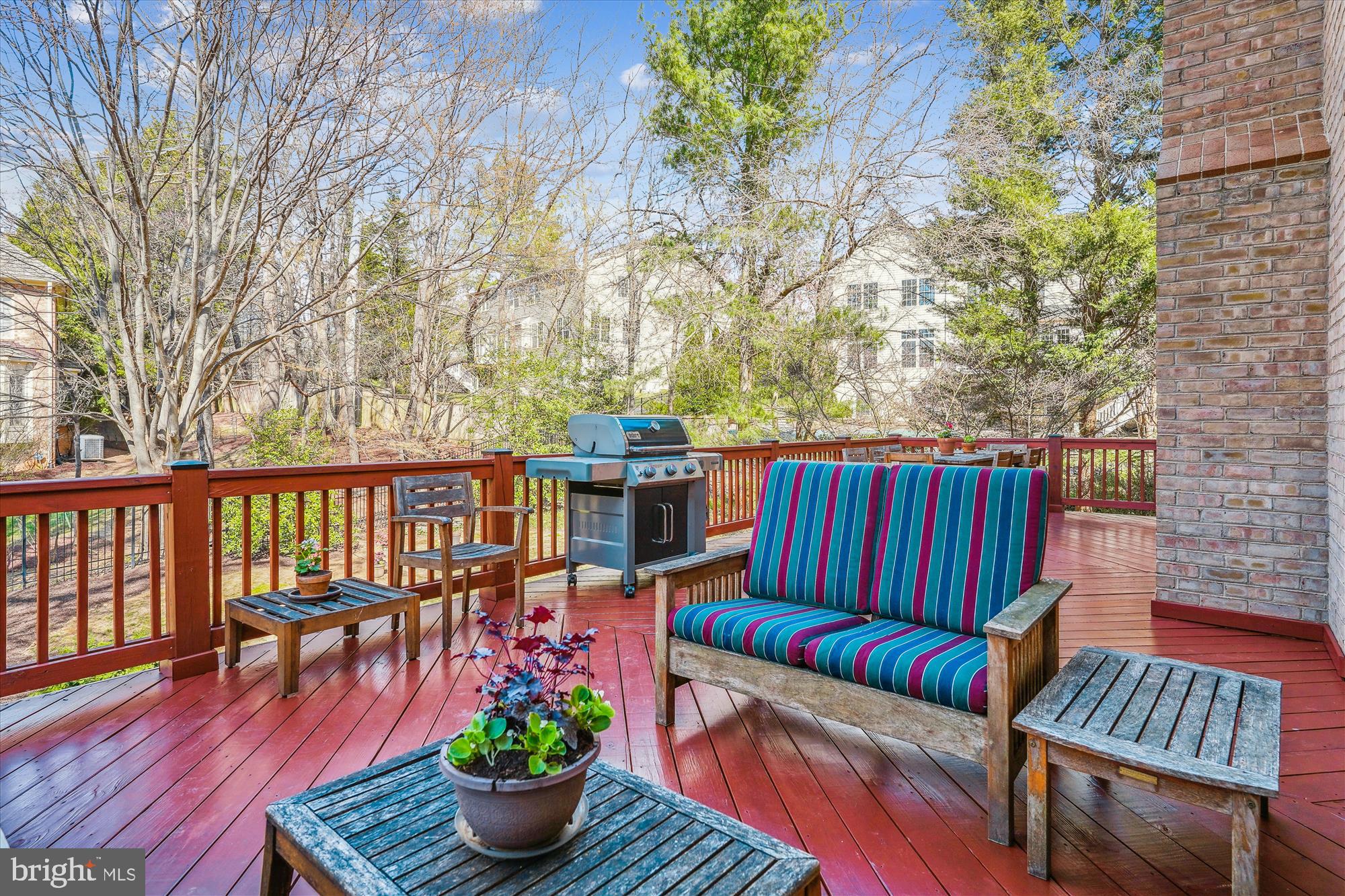 6100 Solitaire Way McLean, VA 22101 - Photo 54 of 60 a view of a patio with couches chairs and wooden floor