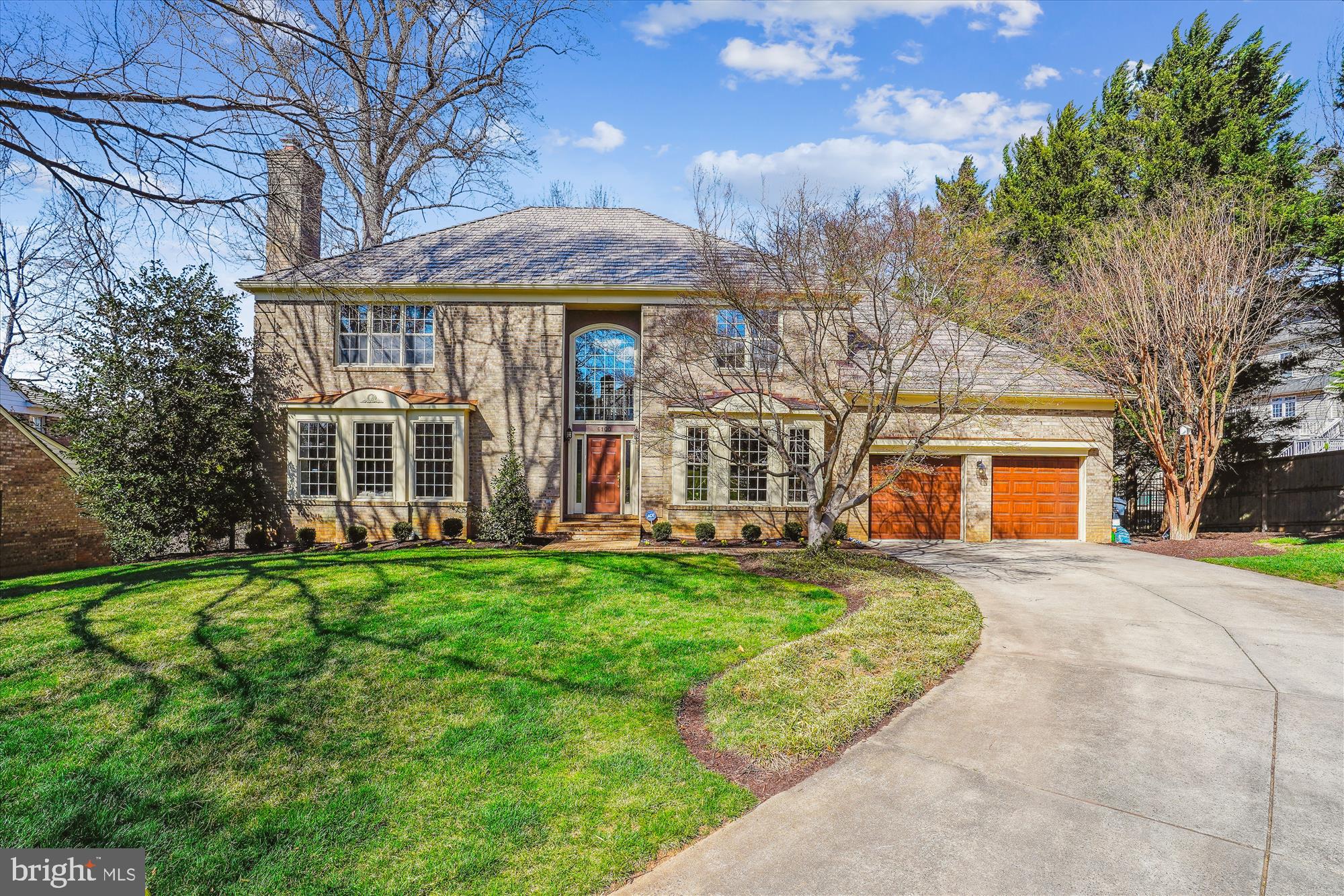 6100 Solitaire Way McLean, VA 22101 - Photo 55 of 60 a front view of a house with a yard